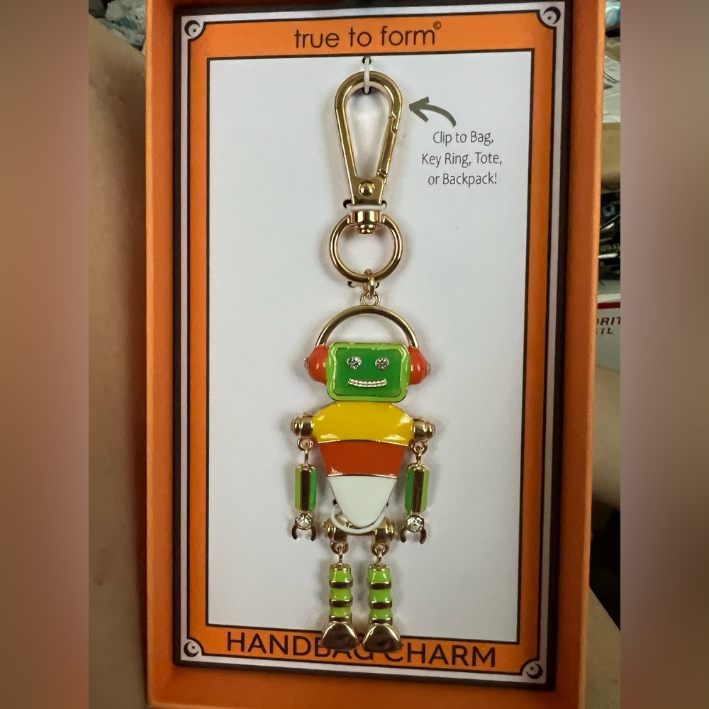 Handbag charm. Robot Candy Corn. The Robots arms & legs move. True To Form